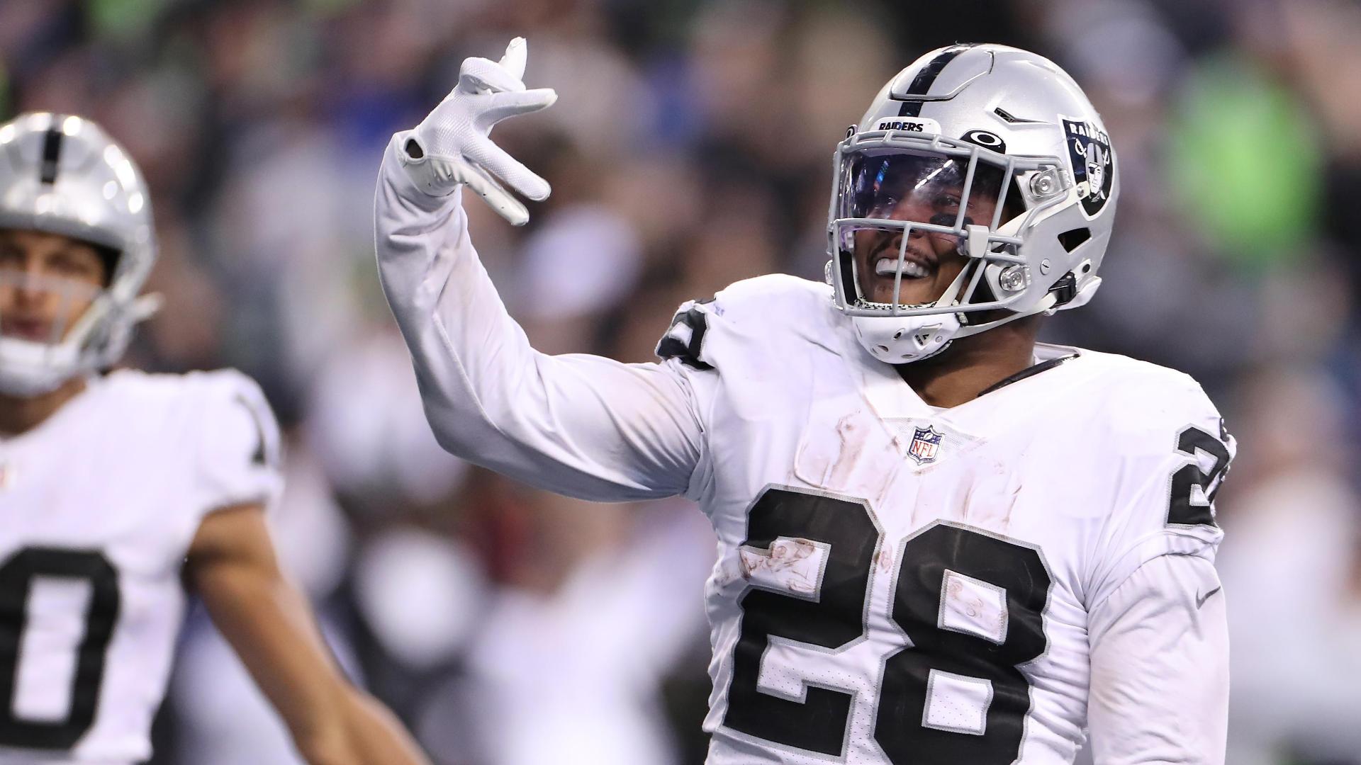 Oakland Raiders running back Josh Jacobs (28) celebrates after