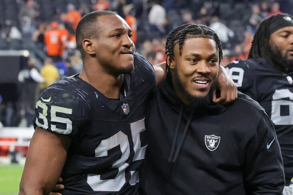 Raiders running backs Josh Jacobs Zamir White